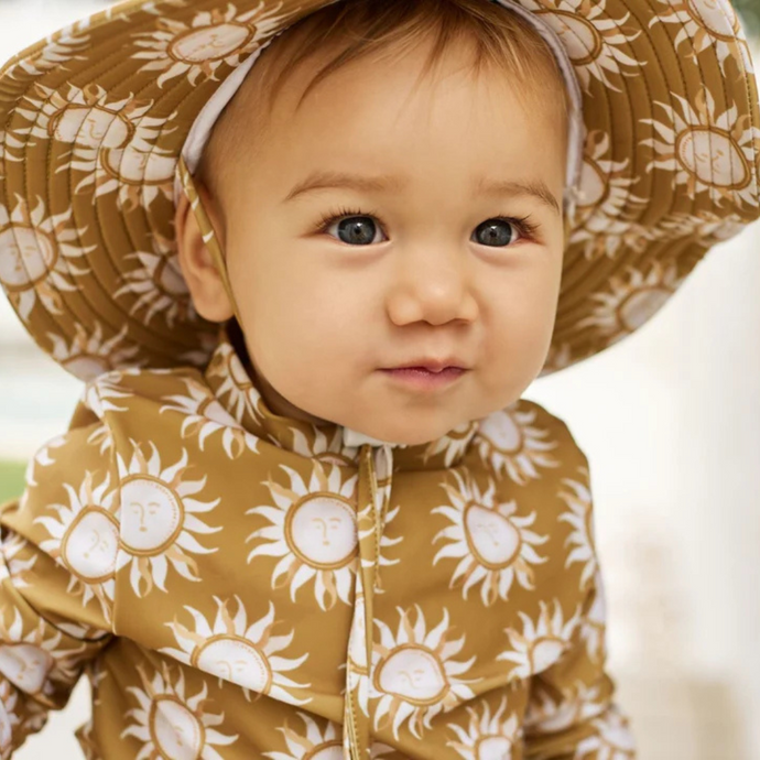 How to dress your little one for a day at the beach this summer